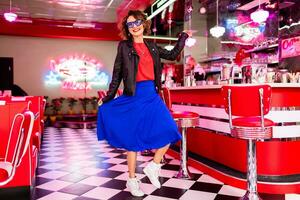 stylish smiling woman in retro vintage cafe photo