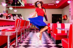 stylish smiling woman in retro vintage cafe photo