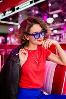 stylish smiling woman in retro vintage cafe photo