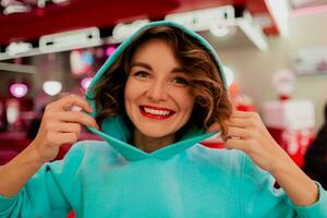 stylish smiling woman in retro vintage cafe photo