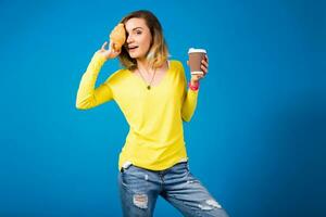 young stylish attractive woman in yellow blouse photo