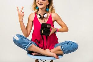 young hipster beautiful woman sitting on chair photo