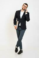 young handsome stylish hipster man in black jacket, business style photo