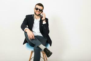 young handsome stylish hipster man in black jacket, business style photo