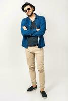 young handsome hipster man stylish outfit, denim shirt photo