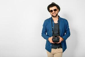 young handsome smiling happy man holding photo camera