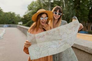 stylish young women traveling together summer fashion style dresses photo