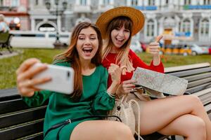 stylish young women traveling together summer fashion style photo