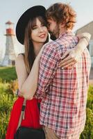 young stylish couple in love in countryside, indie hipster bohemian style photo