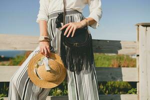 young beautiful stylish woman, spring summer fashion trend, boho style photo