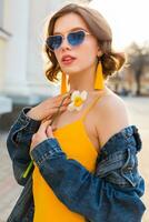 woman in yellow dress summer street style photo