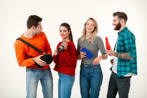 company of friends having fun together listening to music photo