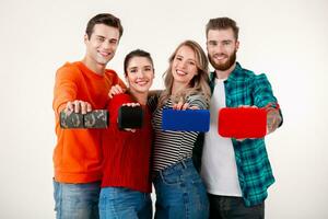 company of friends having fun together listening to music photo