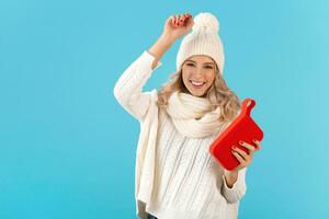 stylish young woman holding wireless speaker photo