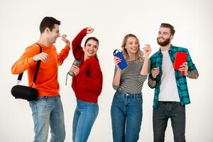 company of friends having fun together listening to music photo