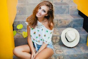 attractive woman in summer style smiling photo