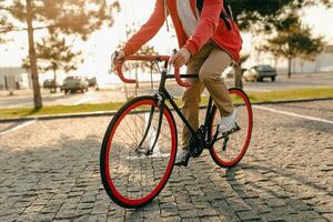 handsome bearded man traveling with bicycle in morning photo