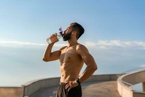 attractive hansome man shirtless with athletic strong body going on morning fitness workout photo