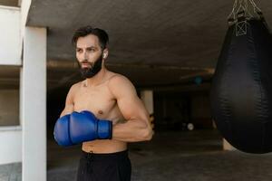 attractive hansome man shirtless with athletic strong body on morning fitness workout exercise photo