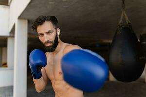 attractive hansome man shirtless with athletic strong body on morning fitness workout exercise photo