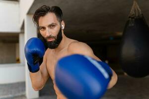 attractive hansome man shirtless with athletic strong body on morning fitness workout exercise photo