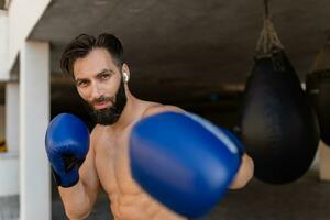 attractive hansome man shirtless with athletic strong body on morning fitness workout exercise photo