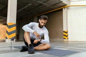 athletic strong hansome man on morning fitness workout exercise photo