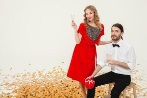 beautiful stylish couple in love celebrating new year photo