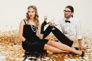 young stylish couple in love celebrating new year photo