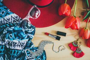 woman's accessories flat lay with red tulips photo