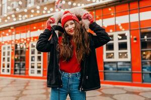 woman having fun in Christmas street photo