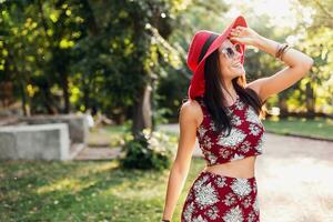 stylish woman in printed outfit, summer style photo