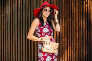 stylish beautiful woman in printed outfit, summer style fashion photo