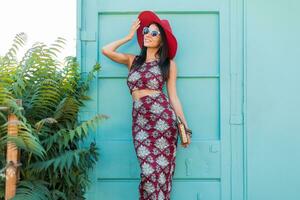 stylish woman in printed outfit, summer style photo