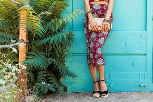 stylish woman in printed outfit, summer style photo