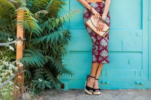 stylish woman in printed outfit, summer style photo