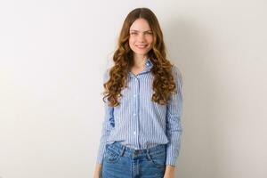 close up portrait of young natural pretty woman with curly haistyle photo