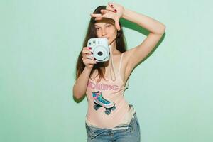 young beautiful hipster woman in hipster style outfit photo