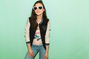 young beautiful hipster woman in hipster style outfit photo