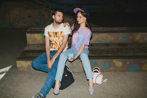 young stylish hipster couple in love, swag outfit photo