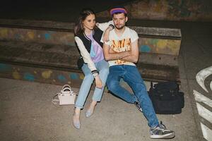 young stylish hipster couple in love, swag outfit photo