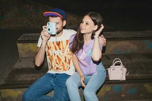 young stylish hipster couple in love, swag outfit photo