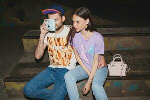 young stylish hipster couple in love, swag outfit photo