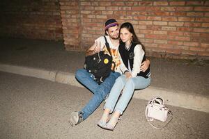 young stylish hipster couple in love, swag outfit photo