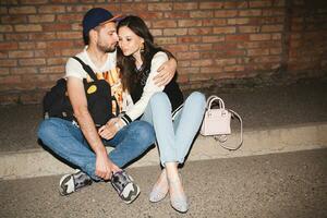 young stylish hipster couple in love, swag outfit photo