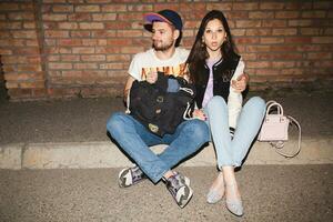 young stylish hipster couple in love, swag outfit photo