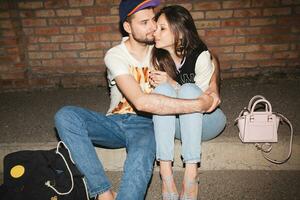 young stylish hipster couple in love, swag outfit photo