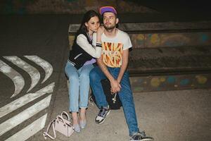 young stylish hipster couple in love, swag outfit photo