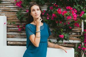 young stylish beautiful woman in blue dress, summer fashion trend photo