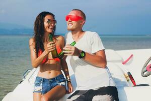 happy hipster woman and man on summer tropical vacation photo